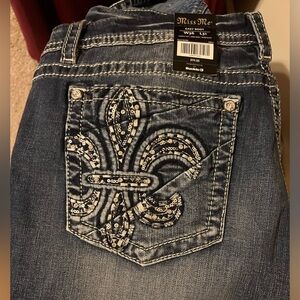 Brand new boot cut Miss Me jeans 36x31. See photo.